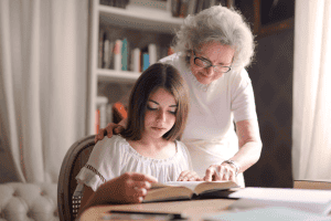 Grandmother helping read
